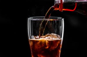 fizzy-cola-drink-macro-shot_53876-14910